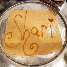 Coffee espresso with caramel and chocolate chips and sprinkles being prepared especially for me!