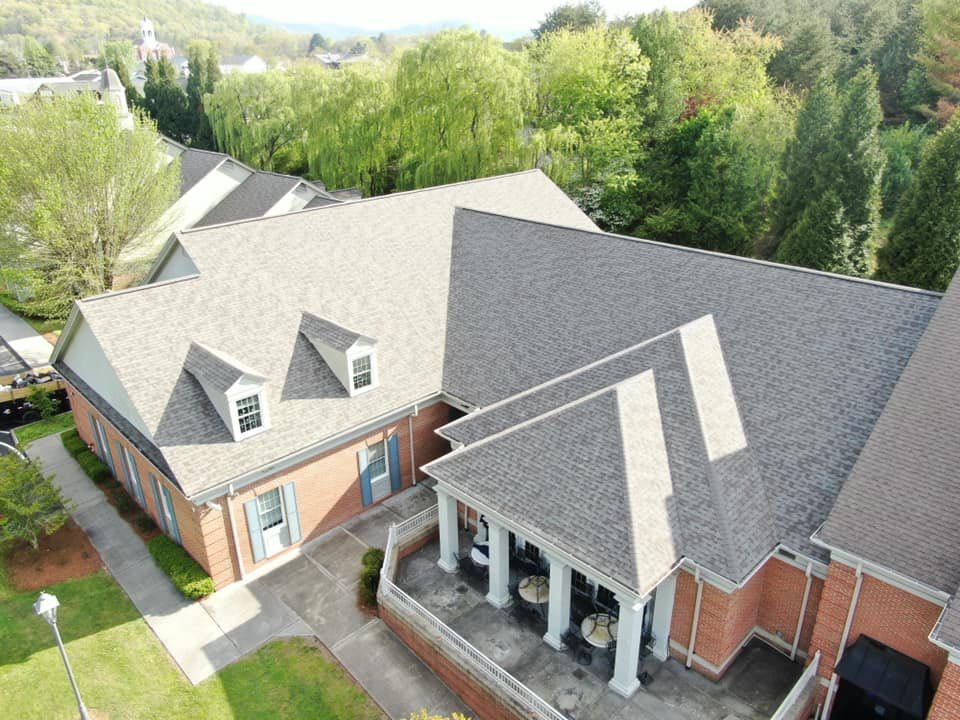 Slide of AMI Roofing