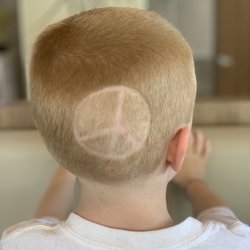 Blake's Barber Shop - Even gave him the peace symbol he wanted