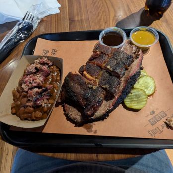 Neighbor Tim’s BBQ - Two meat platter with ribs and brisket and my side was the beans with brisket pieces. - Barbeque Near Me - Boise, Idaho