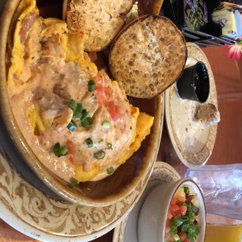 Another Broken Egg Cafe - Crawfish, Shrimp, Sausage Omelette. Side of City Grits (bacon, green onions). - Cafes Near Me - Atlanta, Georgia Another Broken Egg Cafe - Crawfish, Shrimp, Sausage Omelette. Side of City Grits (bacon, green onions). - Cafes Near Me - Atlanta, Georgia