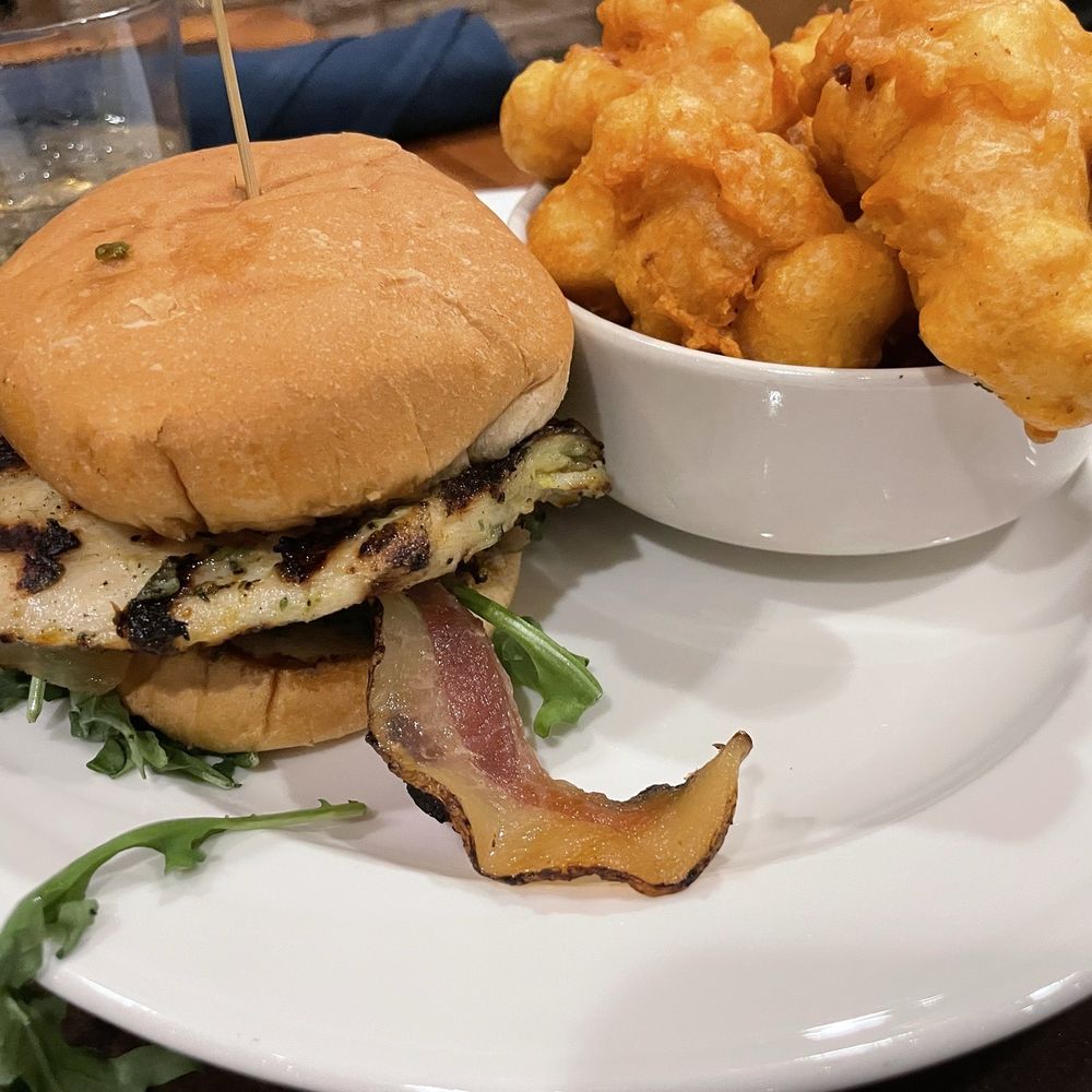 Three Rivers River View Restaurant & Bar - Dynamite Chicken Sandwich with Cheese Curds as a side - Bars Near Me - La Crosse, Wisconsin Three Rivers River View Restaurant & Bar - Dynamite Chicken Sandwich with Cheese Curds as a side - Bars Near Me - La Crosse, Wisconsin