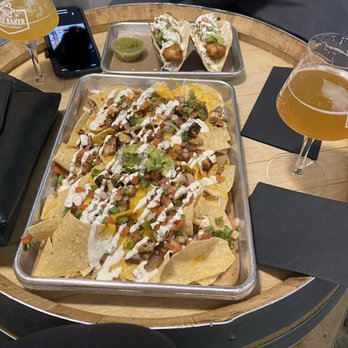 Able Baker Brewing - This was before we ordered a flight and chicken wings. We moved our fish taco plate and got yelled at. - Brewpubs Near Me - Las Vegas, Nevada