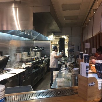 Mecha Noodle Bar - The Hard Working Magic - In the open air kitchen. - Ramen Near Me - Fairfield, Connecticut