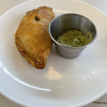 Bushfire Kitchen - Chicken empanada with chimichurri dipping sauce - American Near Me - Brea, California
