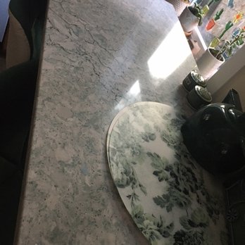 Avrio Surfaces - The bar top table - Countertop Installation Near Me - Redmond, Washington