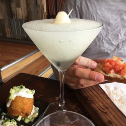 Mojo's Cafe & Tapas Bar - Lychee cocktail, Croquetas and Italian style toast.