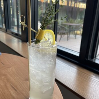 Pusadee's Garden - The Garden Tonic lavender infused bluecoat gin, hojun yuzu sake, combier liqueur de violette, lemon-thyme oleo saccharum, topo chico - Thai Near Me - Pittsburgh, Pennsylvania