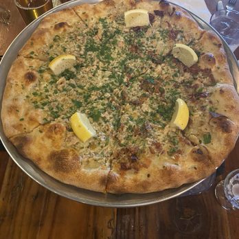 ABV Public House - Clam pizza, half with bacon & half without. It's a delicious delight! - Bars Near Me - Hillsboro, Oregon