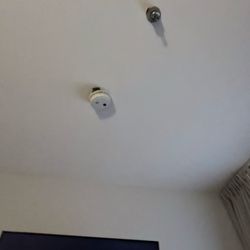 Comfort Inn - smoke detector hanging by the wires above the bed