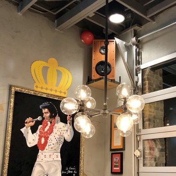 Raising Cane's Chicken Fingers - a painting of elvis presley - Fast Food Near Me - Bellevue, Nebraska Raising Cane's Chicken Fingers - a painting of elvis presley - Fast Food Near Me - Bellevue, Nebraska