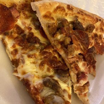 Merlins Pizza - Meaty Feast Deluxe - Pizza Near Me - Destin, Florida Merlins Pizza - Meaty Feast Deluxe - Pizza Near Me - Destin, Florida