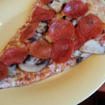 Rotelli - Cook pizza but not toppings - Italian Near Me - Tamarac, Florida
