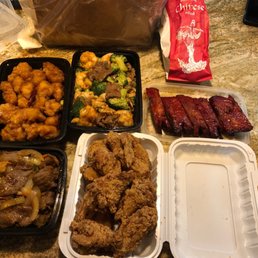 a variety of food in plastic containers a variety of food in plastic containers