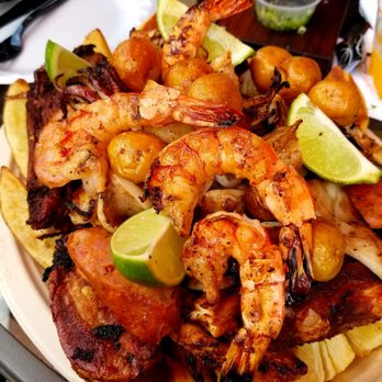 Las Tablas - A Combination of Steak, Chicken, Sausage, Ribs, Shrimp, Octopus, Plantains, Potatoes, Yuca, and Arepas! Amazing! - Steakhouses Near Me - Chicago, Illinois