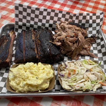 Smokin Barrel BBQ - a tray of pulled pork, coleslaw, coleslaw, and coleslaw - Barbeque Near Me - Omaha, Nebraska