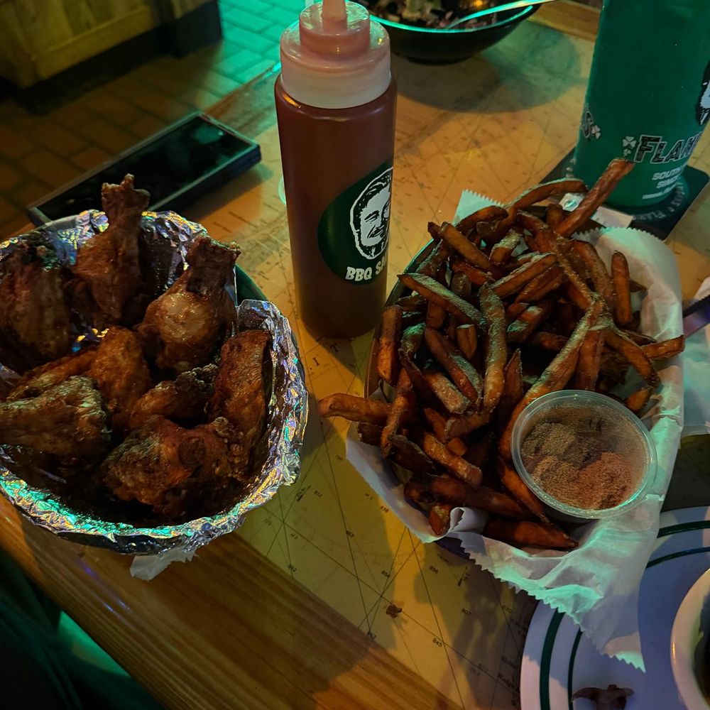 Flanigan's Seafood Bar & Grill - Burnt wings and fries. - New American Near Me - Miami Beach, Florida