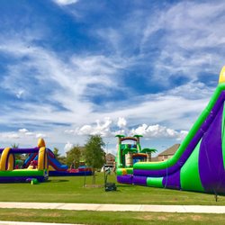 Jump & Joy Party Rentals - Waterslides available from 14' , 16', 20, 22' & 24' Tall..... Single or Double lane for all your summer water activity events...