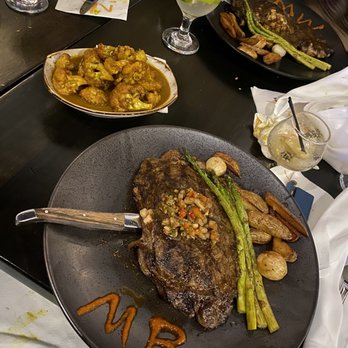 NK Restaurant - Jerk ribeye curry cauliflower - Caribbean Near Me - East Meadow, New York