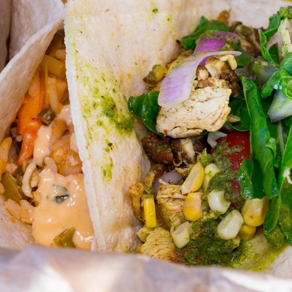 The Kitchen - Paprika Shrimp Taco (with coconut rice, red peppers, and leeks) Spiced Chicken Taco (with cherry tomatoes, chard, onion, corn, chimichurri) - Venues & Event Spaces Near Me - Columbus, Ohio The Kitchen - Paprika Shrimp Taco (with coconut rice, red peppers, and leeks) Spiced Chicken Taco (with cherry tomatoes, chard, onion, corn, chimichurri) - Venues & Event Spaces Near Me - Columbus, Ohio