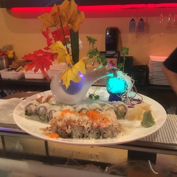 Sushi 99 - Our plate of sushi! Volcano roll, California roll, shrimp tempora roll! Beautiful presentation - Japanese Near Me - Orlando, Florida Sushi 99 - Our plate of sushi! Volcano roll, California roll, shrimp tempora roll! Beautiful presentation - Japanese Near Me - Orlando, Florida