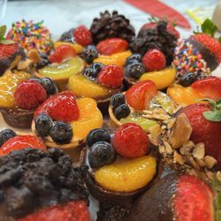 Publix Super Markets - Chocolate dip, strawberries, and fruit tarts, vanilla, and chocolate pastry ~ special ordered 20 trays for our clients