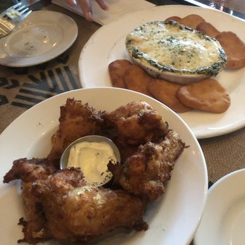 BREW'd Craft Pub - Wings and fried naan in the back with decadent cheese dip! - Gastropubs Near Me - Honolulu, Hawaii