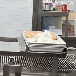 Krispy Kreme - Six glazed donuts, and a dirty towel