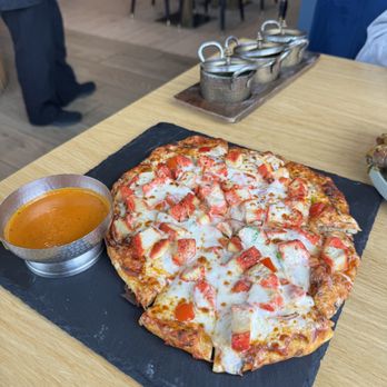 Clove Indian Cuisine - Happy hour flatbread - Indian Near Me - Renton, Washington