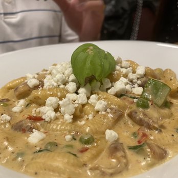 Zucchinis Cucina - a close up of a pasta dish - Italian Near Me - Oakville, Ontario Zucchinis Cucina - a close up of a pasta dish - Italian Near Me - Oakville, Ontario