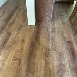 Romanoff Renovations - Dinning room vinyl plank floor.