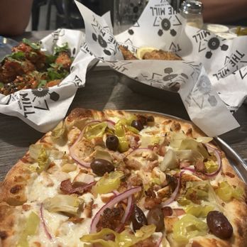 The Planing Mill Artisan Pizzeria - The funky chicken pizza but I added toppings so delicious. The thia wings and lemon pepper wings and of course the beer - Pizza Near Me - Visalia, California The Planing Mill Artisan Pizzeria - The funky chicken pizza but I added toppings so delicious. The thia wings and lemon pepper wings and of course the beer - Pizza Near Me - Visalia, California