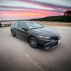 MC Car Rentals - 23 Toyota Camry Hybrid. Black exterior and black interior. Just a beautiful car. Amazing on gas!!!