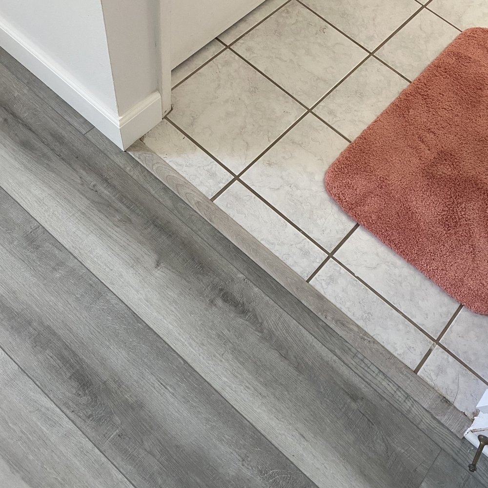 Natural Flooring - Transition from bedroom to bathroom - Flooring Near Me - Santa Clarita, California Natural Flooring - Transition from bedroom to bathroom - Flooring Near Me - Santa Clarita, California