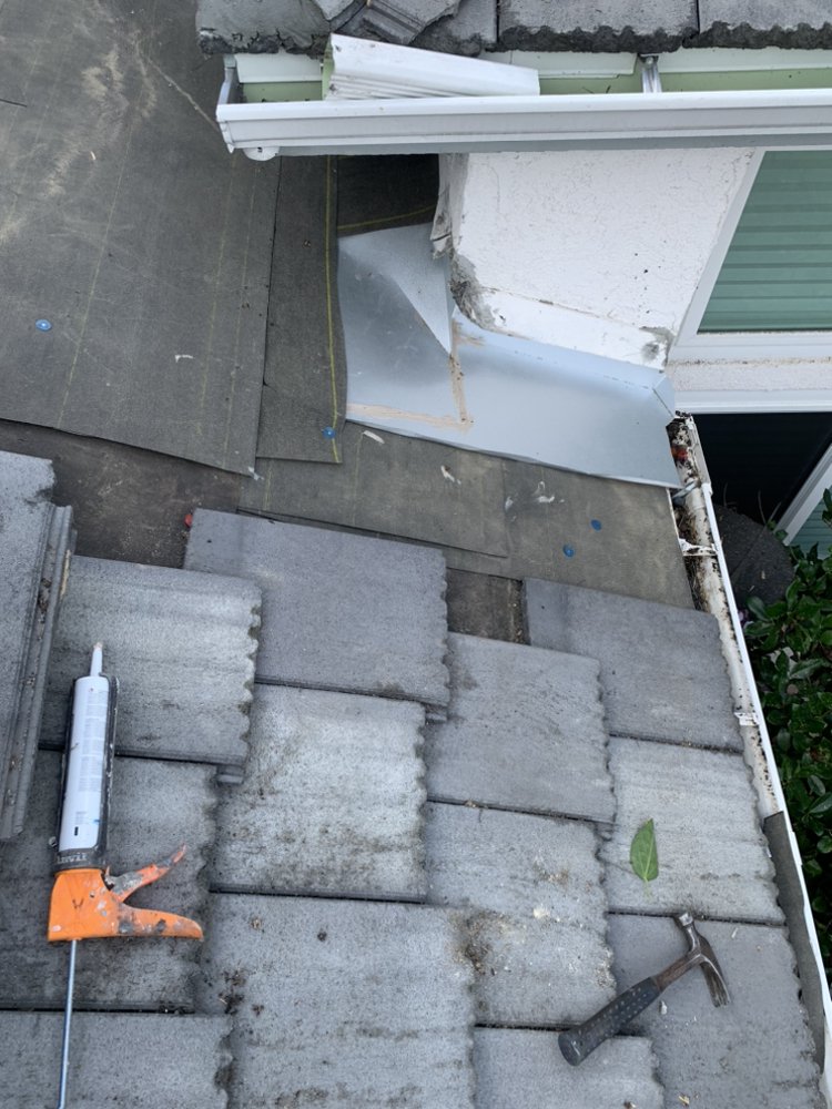 Slide of Aqua MG Roofing and Painting