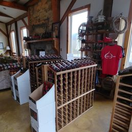 a wine rack with wine bottles a wine rack with wine bottles