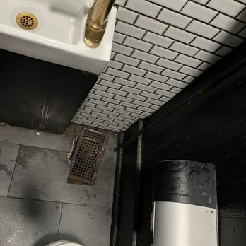 Blind Tiger Pub - Tight bathroom - American Near Me - Charleston, South Carolina