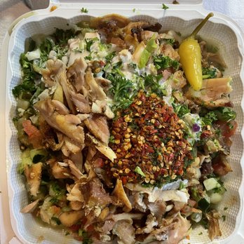 Falafel Stop - Chicken shawarma salad with some hot sauces and other toppings. - Falafel Near Me - Sunnyvale, California Falafel Stop - Chicken shawarma salad with some hot sauces and other toppings. - Falafel Near Me - Sunnyvale, California