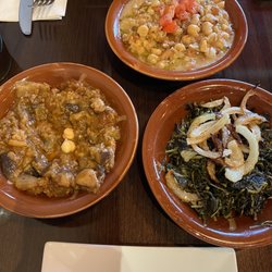 Bayroot - Mousakka, Foul Bayroot Style, and dandelion greens! Great trio of flavors!