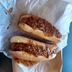Bama Hotdogs - Two chili dogs with raw onion and mustard.