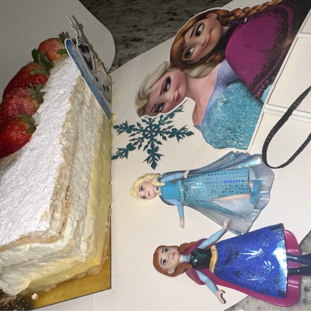 Delicias de Espana 2 - Tarta Mil Hojas being decorated for b-day party - Spanish Near Me - Miami, Florida