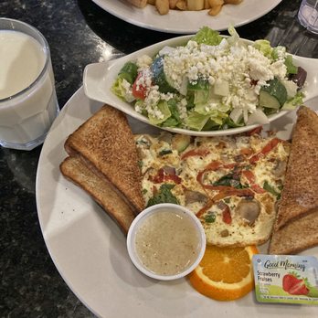 Symposium Cafe Restaurant Waterdown - Build-Your-Own Omelette (with veggies), toasts, potatoes, side Mediterranean Salad - Breakfast & Brunch Near Me - Waterdown, Ontario Symposium Cafe Restaurant Waterdown - Build-Your-Own Omelette (with veggies), toasts, potatoes, side Mediterranean Salad - Breakfast & Brunch Near Me - Waterdown, Ontario