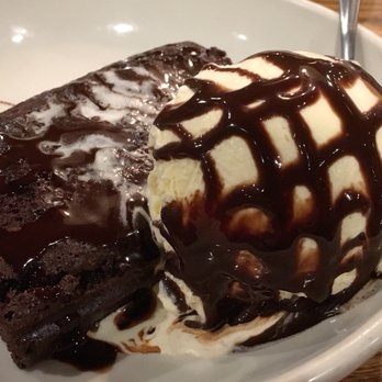 Cattle Baron - Warm cappuccino brownie with vanilla ice cream. Look how huge! - Steakhouses Near Me - El Paso, Texas