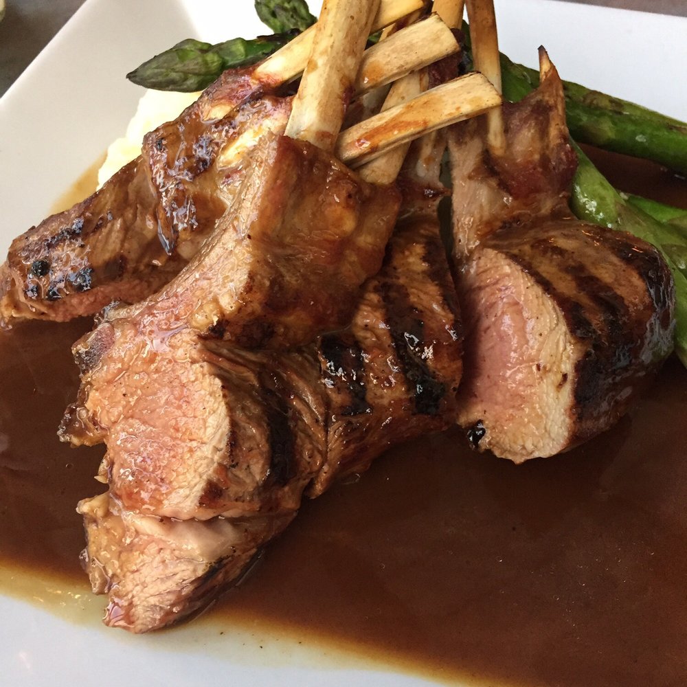 Bistro 1051 - Grilled Rack of Lamb with a red wine reduction and mashed potatoes - Italian Near Me - Clark, New Jersey Bistro 1051 - Grilled Rack of Lamb with a red wine reduction and mashed potatoes - Italian Near Me - Clark, New Jersey
