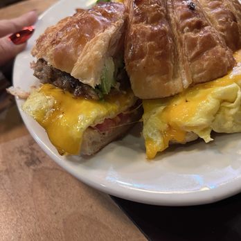 Simple Simon's Bakery & Bistro - Breakfast Croissant Club $15.50 homemade chicken apple sausage and two eggs any style. Served with potatoes. - Bakeries Near Me - Riverside, California Simple Simon's Bakery & Bistro - Breakfast Croissant Club $15.50 homemade chicken apple sausage and two eggs any style. Served with potatoes. - Bakeries Near Me - Riverside, California
