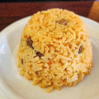 Sabor Tropical Restaurant and Lounge - Puerto Rican Rice (arroz con gandules). - Latin American Near Me - Milwaukee, Wisconsin Sabor Tropical Restaurant and Lounge - Puerto Rican Rice (arroz con gandules). - Latin American Near Me - Milwaukee, Wisconsin