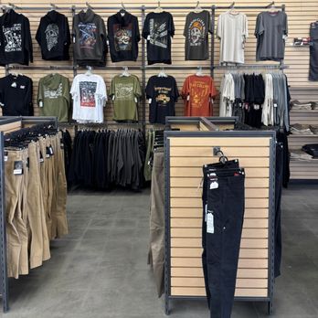 Work World - Ariat graphic t-shirts and pants - Shoe Stores Near Me - Merced, California Work World - Ariat graphic t-shirts and pants - Shoe Stores Near Me - Merced, California