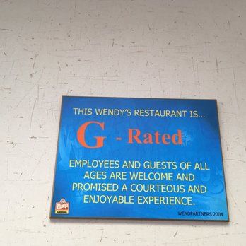 Wendy's - a sign on the wall of a restaurant - Burgers Near Me - Binghamton, New York