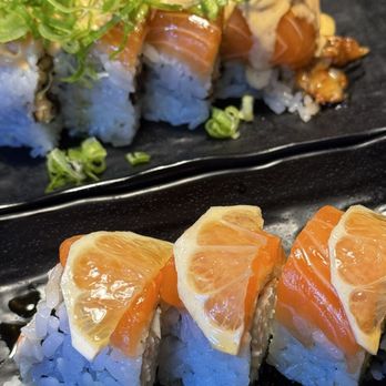 Neko Loco Sushi - Lemon salmon roll (front), sun of the beach roll (back). - Japanese Near Me - Las Vegas, Nevada Neko Loco Sushi - Lemon salmon roll (front), sun of the beach roll (back). - Japanese Near Me - Las Vegas, Nevada