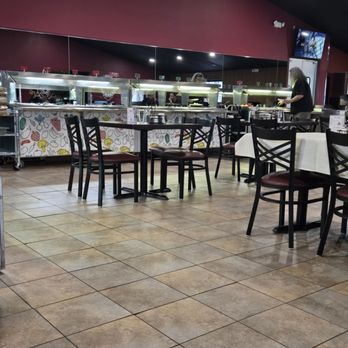 Tikka Masala Grill & Buffet - Buffet carts and dining area - Indian Near Me - Hilltop, Minnesota